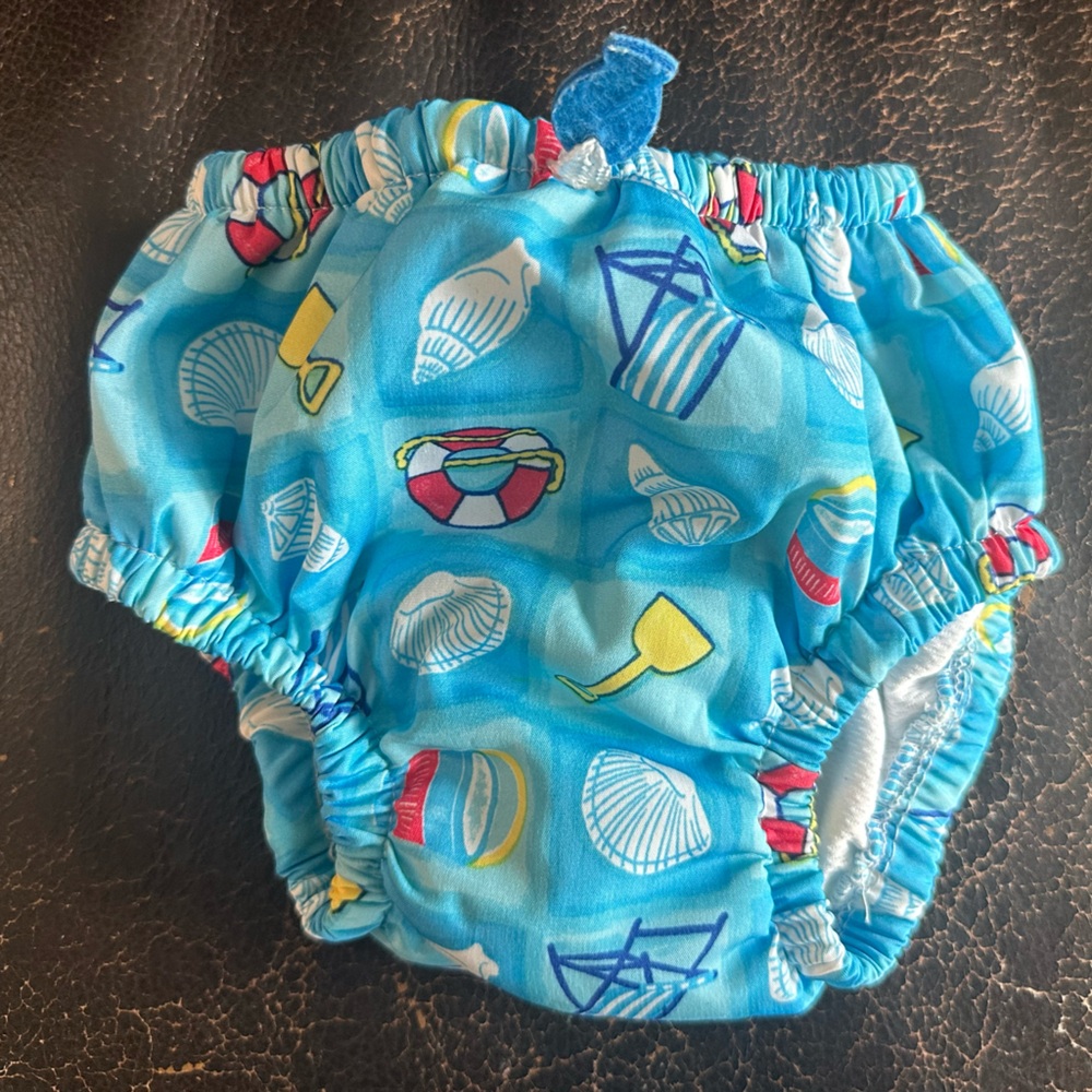 i play. Blue Seashell Swim Diaper